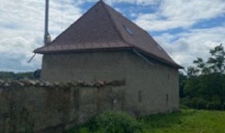 Rénovation de toiture dauphinoise avec couverture en tuile écaille vers Bourgoin-Jallieu 